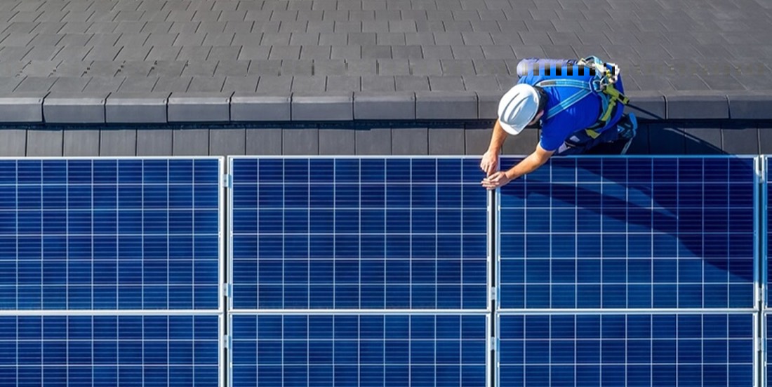 Technician performing solar system maintenance and health check